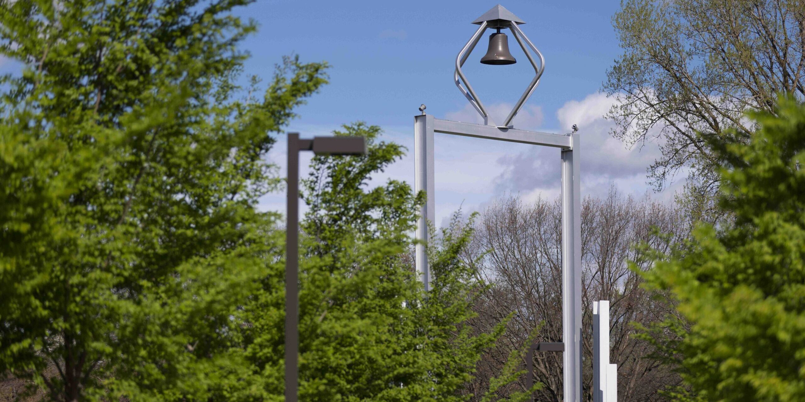 Purdue University Northwest bell tower landmark between Lawshe Hall, Student Union Library Building and Nils Bioscience Building.